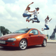 The most ‘90s press photo ever taken, presenting the 1994 Opel Tigra. Photo Credit: GM